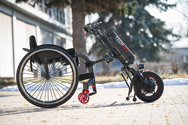 Wózek inwalidzki z przystawką elektryczna Techlife