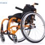 Wózek inwalidzki dziecięcy Sagitta w kolorze pomarańczowym